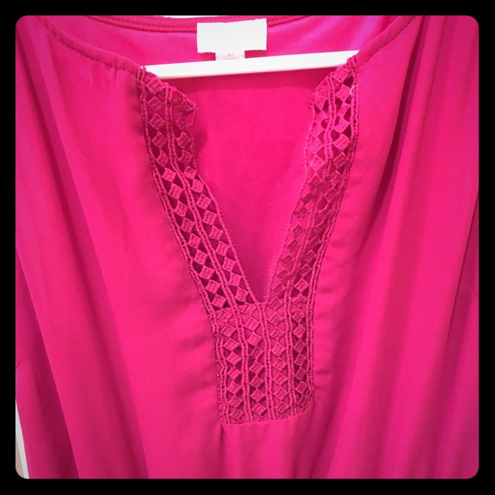 Pink dress with crocheted v-neck